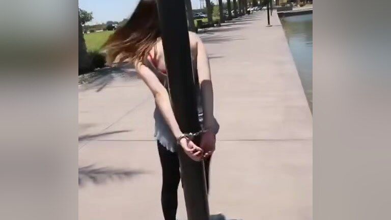 Femdom Clips Girl Handcuffed To Lamp Post On River Bank TubeWolf - 1