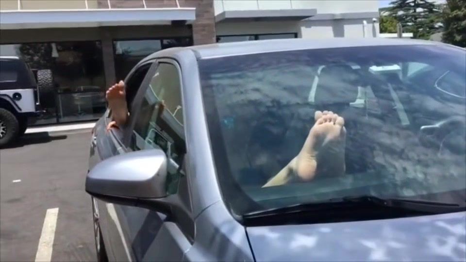 Hungarian College Girls Show Off Their Soles In Public As They Put Their Legs Through Car Window Pool