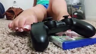 Amatures Gone Wild Sexy Girl With French Peticure Plays The Playstation With Nothing But Her Little Feet Fat Pussy
