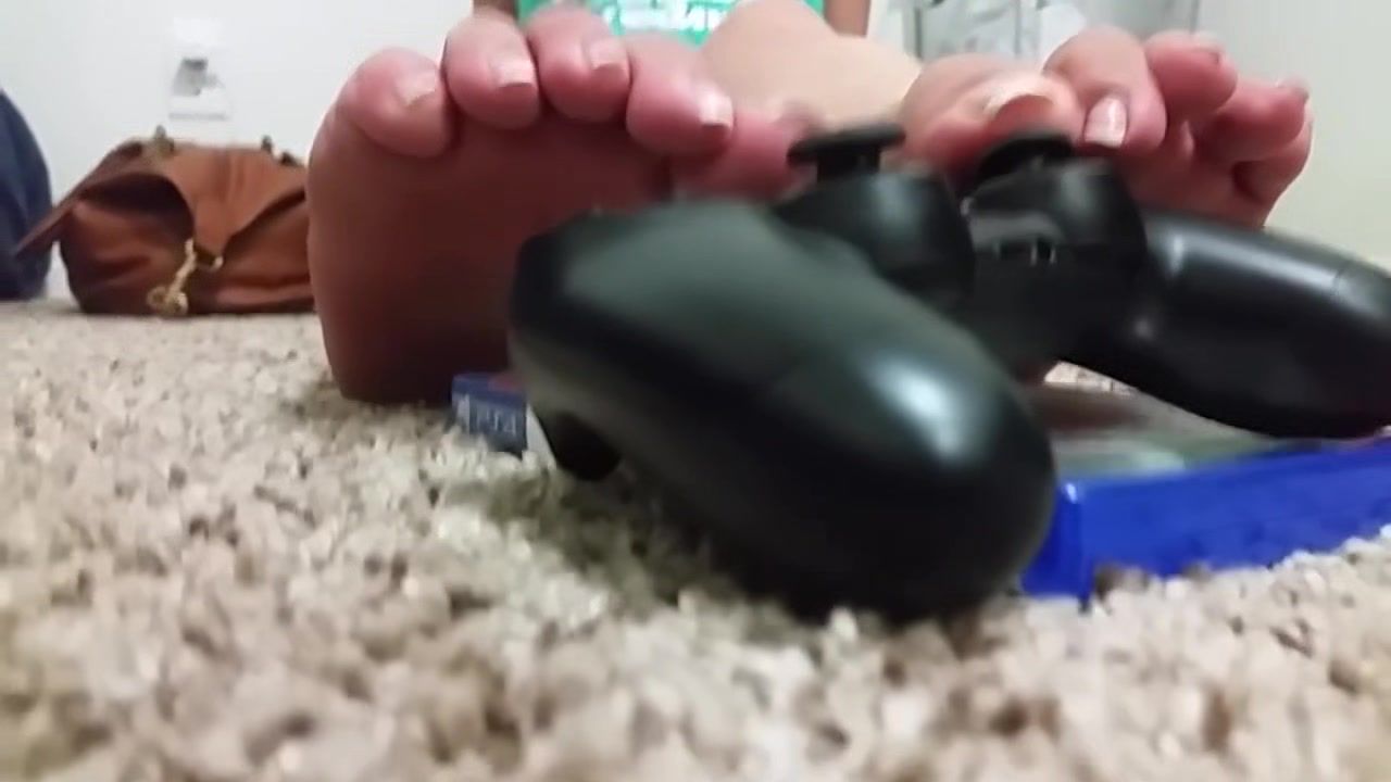 Ginger Sexy Girl With French Peticure Plays The Playstation With Nothing But Her Little Feet Gag