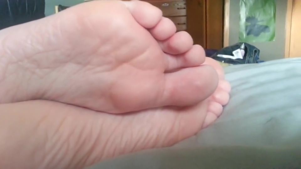 Bare Feet Closeup While Amateur Lounges On Bed Hot