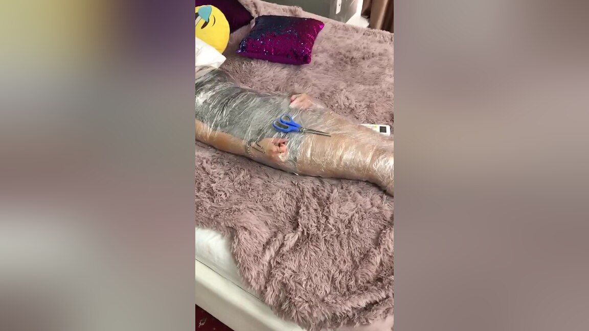 eFappy Webcam Girl Mummified In Cling Film Role Play