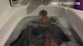 Black Hair Naughty Babe Washing Her Sexy Tattooed Legs And Feet In The Bathtub Porno Amateur