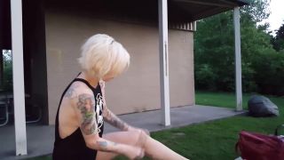eFappy Sexy Tattooed Blonde Putting Nylon Stockings On Her Attractive Legs And Feet Outdoors MilkingTable