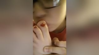 Lady Amateur Teen With Glasses Passionately Sucking Her Sexy Toes On The Camera ThePorndude
