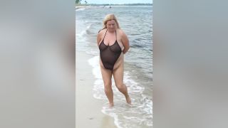Ginger Handcuffed In Sheer Swimsuit On The Beach Two