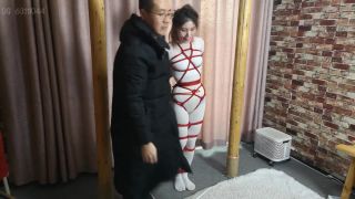 Family Taboo Strung Up In Red Rope Licking Pussy