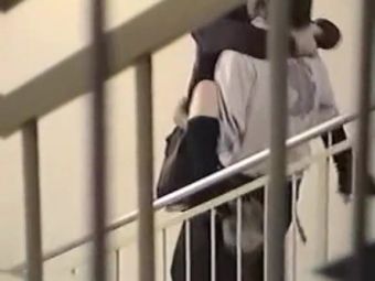 XTube Horny Asian couple having sex on the stairs at the entrance HD21